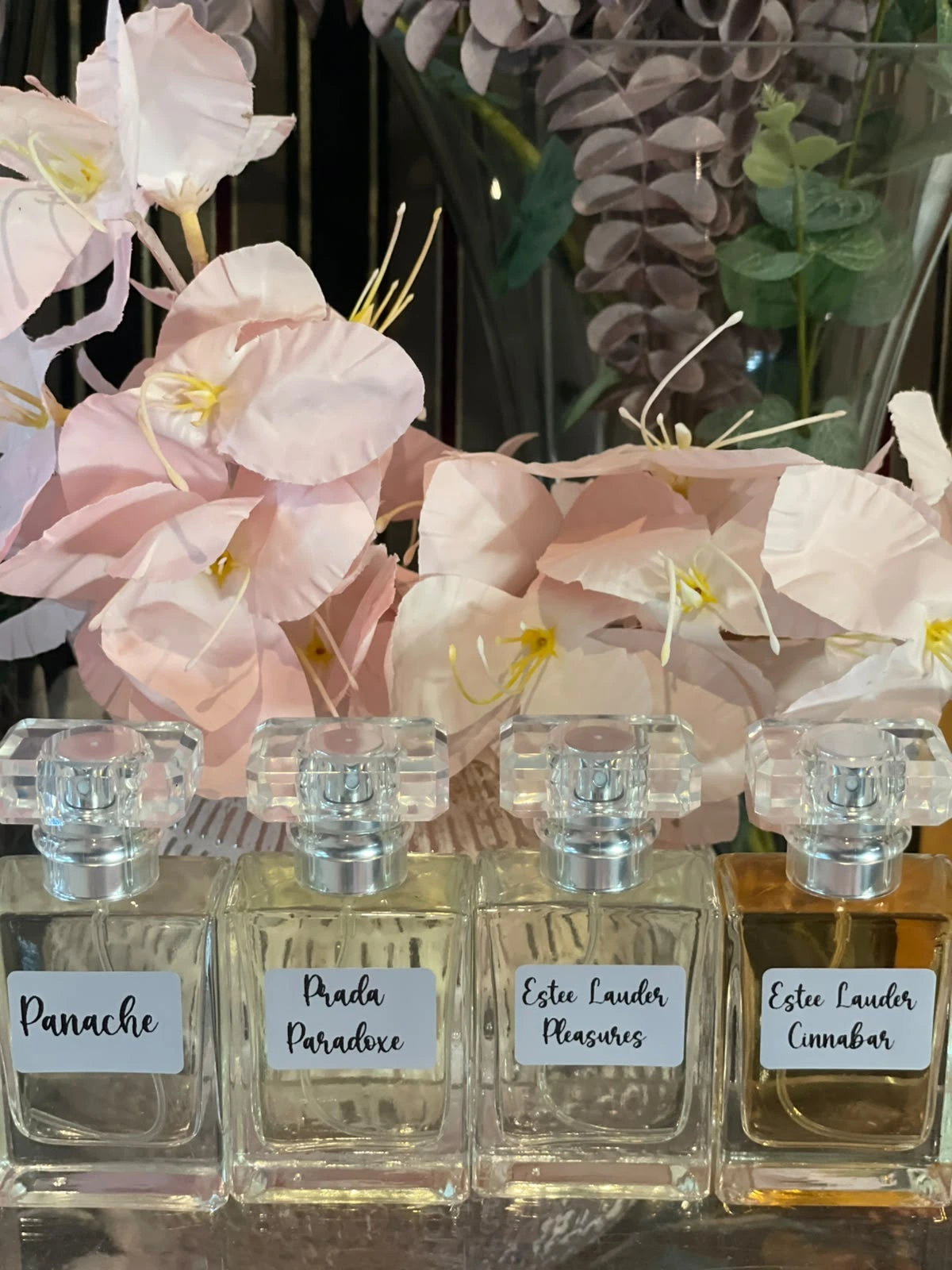 The Double Based Oil range lined up in diamond-glass bottles